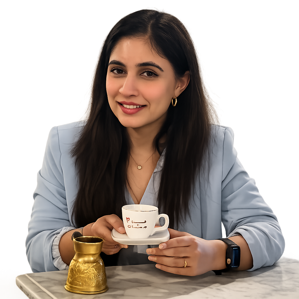 Dr. Kinshuki Sharma smiling warmly over a cup of coffee