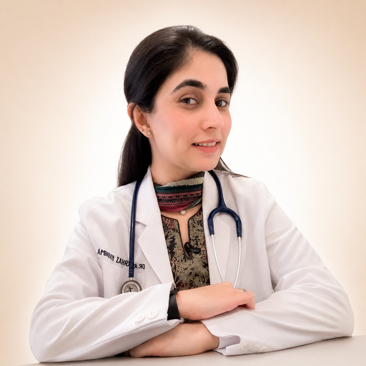 Dr. Kinshuki Sharma, pediatrician, in her white coat with a stethoscope